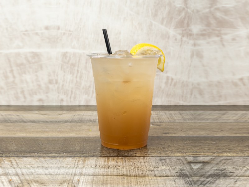 A Long Island iced tea with a lemon wedge